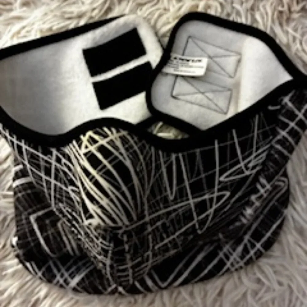 Black & white Face Mask for outdoor protection while skiing or riding.